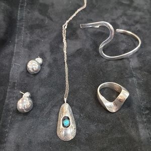 Navajo Sterling earrings & 2 necklace, also unknown abstract bracelet & 2 rings.